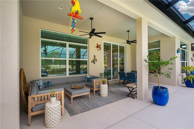 view of patio with a ceiling fan and outdoor lounge area