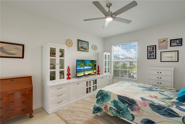bedroom featuring ceiling fan and light wood-style flooring