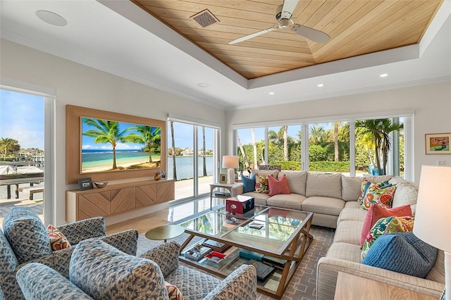 815 Starboard Dr, Vero Beach, FL 32963 - sunroom / solarium featuring a water view, wood ceiling, a raised ceiling, and plenty of natural light
