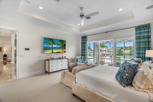 815 Starboard Dr, Vero Beach, FL 32963 - bedroom featuring a raised ceiling, ornamental molding, light colored carpet, and access to exterior
