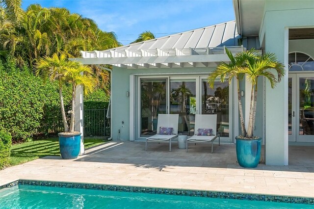815 Starboard Dr, Vero Beach, FL 32963 - back of property with a pergola and a patio area