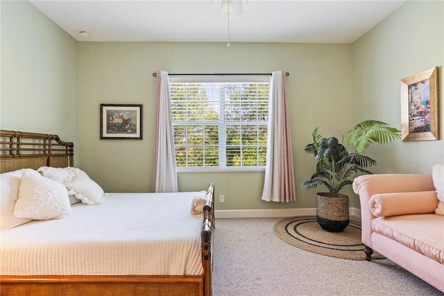 carpeted bedroom with baseboards