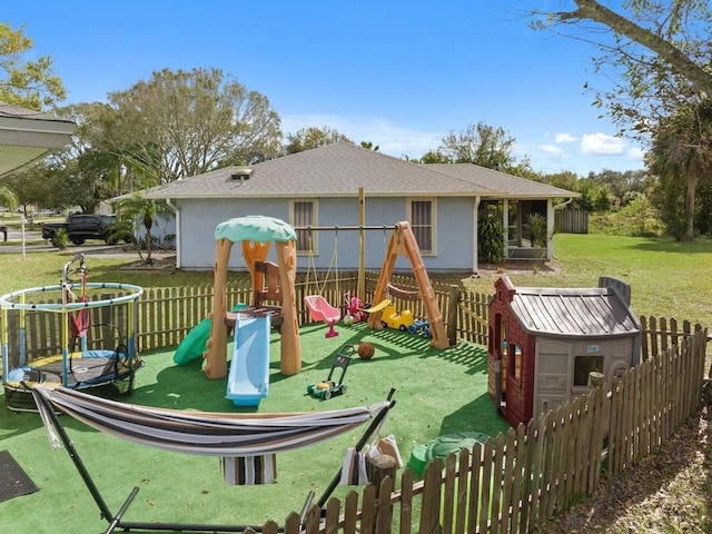 view of playground featuring a yard