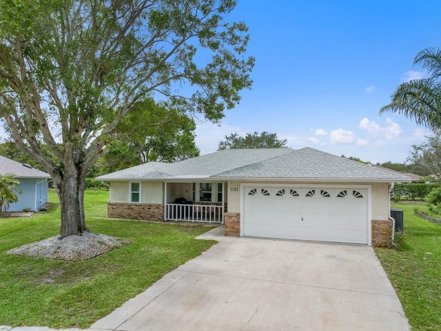 ranch-style house with central AC unit, a garage, a front yard, and a porch