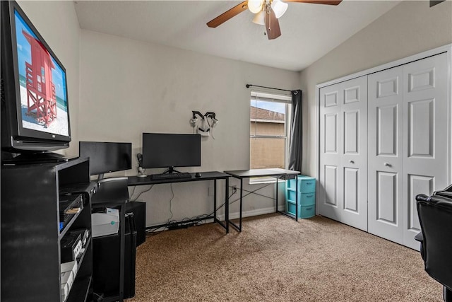 carpeted office with ceiling fan and lofted ceiling