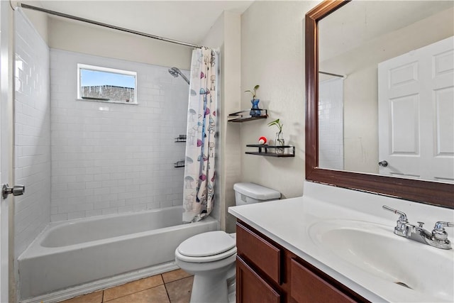 full bathroom with vanity, toilet, tile patterned flooring, and shower / bath combo with shower curtain