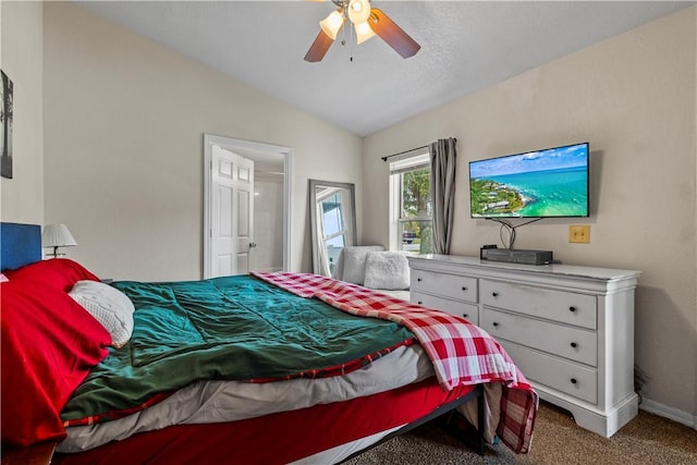 carpeted bedroom with vaulted ceiling and ceiling fan