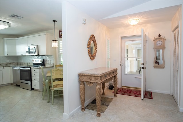 view of tiled entrance foyer