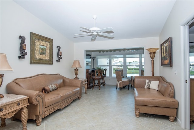 living room featuring ceiling fan and light tile patterned flooring