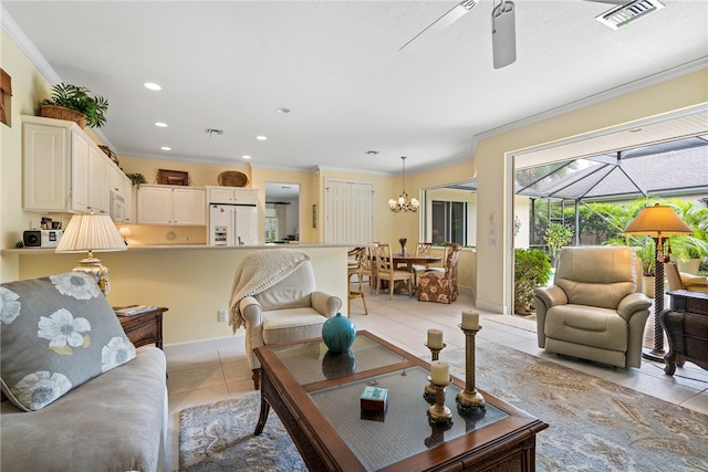 living room featuring ceiling fan with notable chandelier, light tile patterned floors, and crown molding