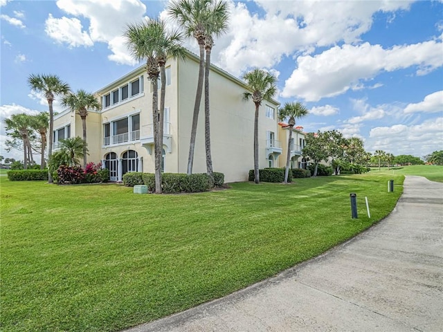 exterior space with a lawn