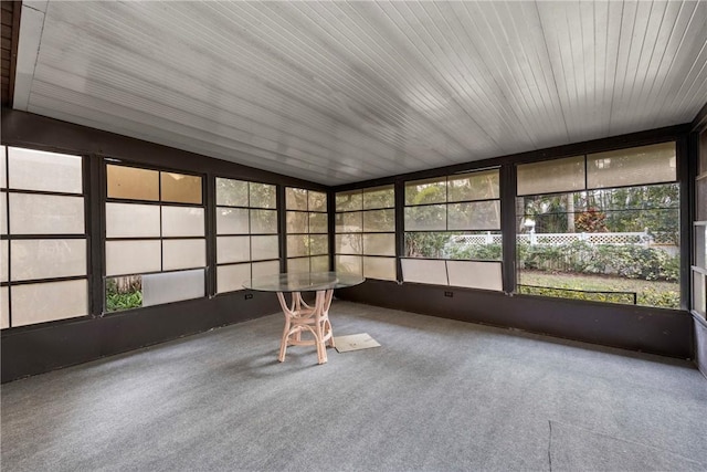 2821 21st Pl, Vero Beach, FL 32960 - unfurnished sunroom featuring carpet and vaulted ceiling