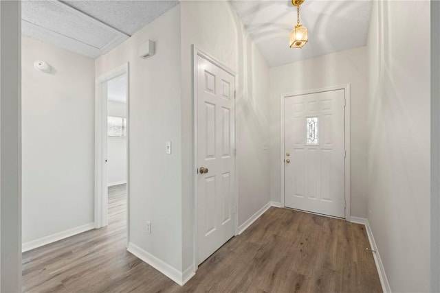 2821 21st Pl, Vero Beach, FL 32960 - entryway featuring wood finished floors, baseboards, and plenty of natural light