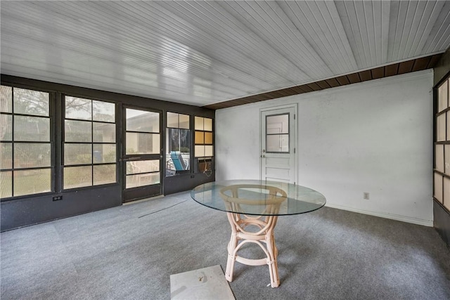 2821 21st Pl, Vero Beach, FL 32960 - unfurnished sunroom featuring carpet floors and baseboards