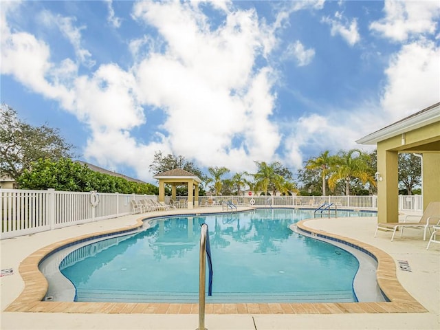 view of pool with a gazebo and a patio