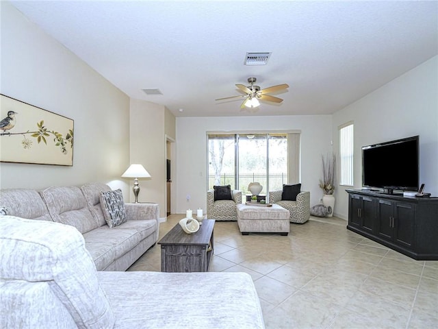 living room featuring ceiling fan