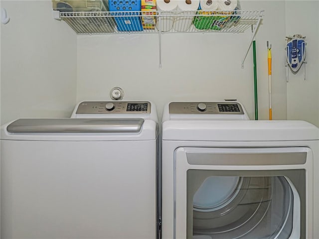 laundry area featuring washing machine and dryer