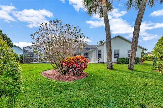 view of yard featuring a lanai