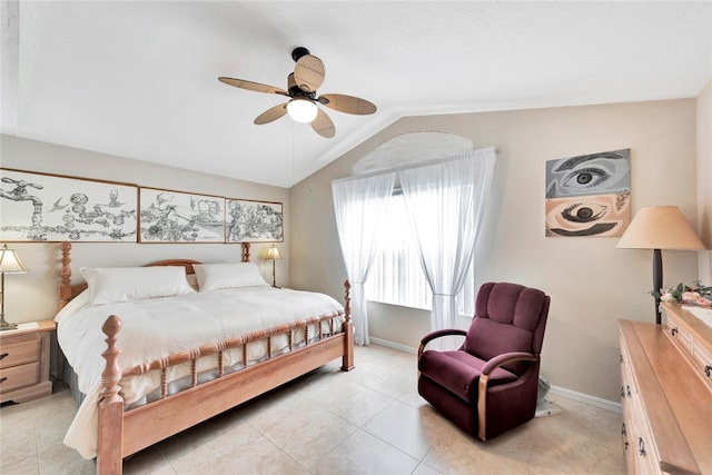 tiled bedroom with vaulted ceiling and ceiling fan