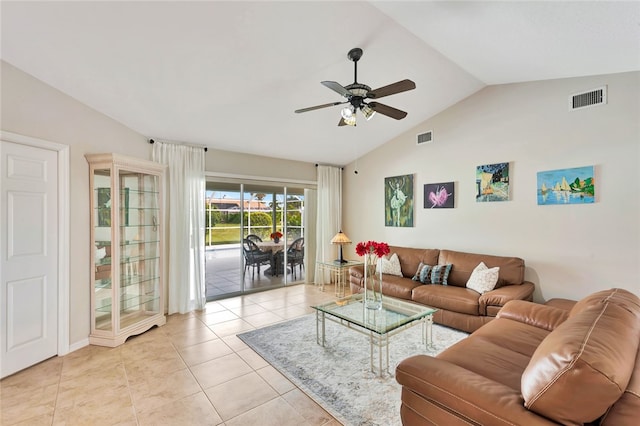 living room with light tile patterned floors, vaulted ceiling, and ceiling fan