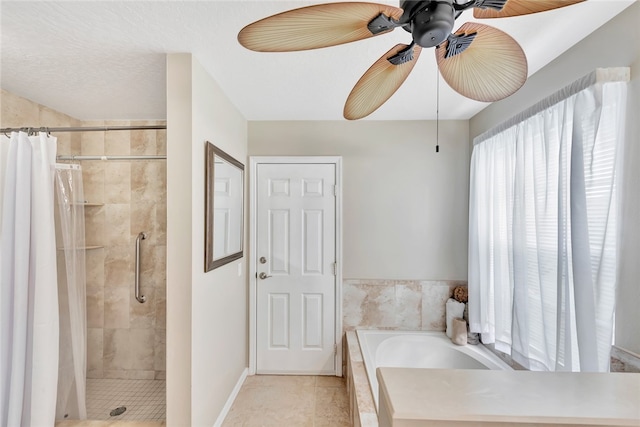 bathroom featuring tile patterned floors, ceiling fan, and shower with separate bathtub