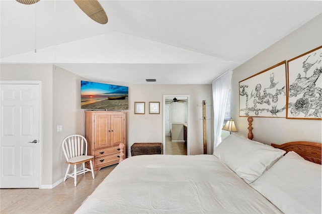 tiled bedroom featuring ceiling fan and vaulted ceiling