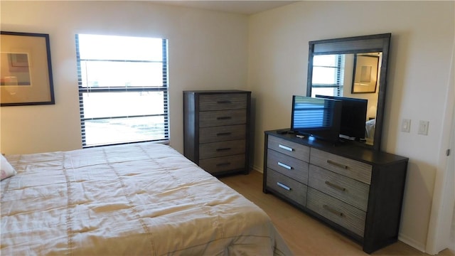 bedroom featuring light hardwood / wood-style floors