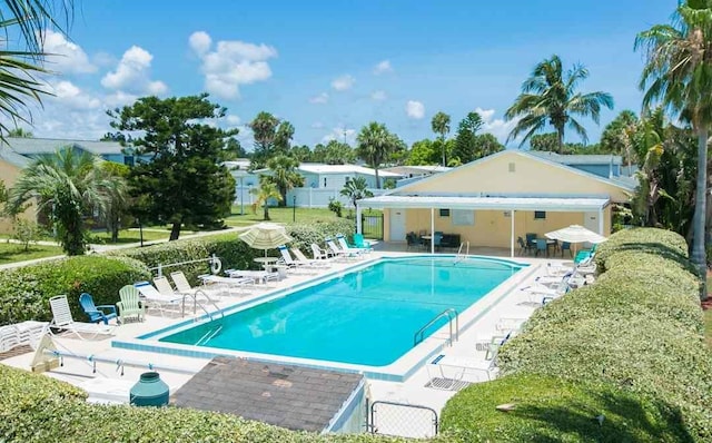 8520 US Highway 1 Unit 11E, Micco, FL 32976 - pool featuring a patio area and fence