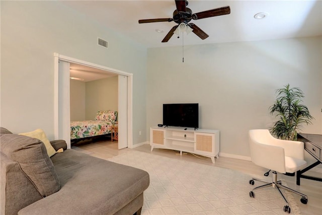 8520 US Highway 1 Unit 11E, Micco, FL 32976 - living area featuring recessed lighting, visible vents, baseboards, and ceiling fan