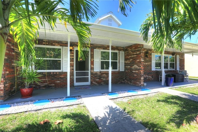 8520 US Highway 1 Unit 11E, Micco, FL 32976 - entrance to property with covered porch and brick siding