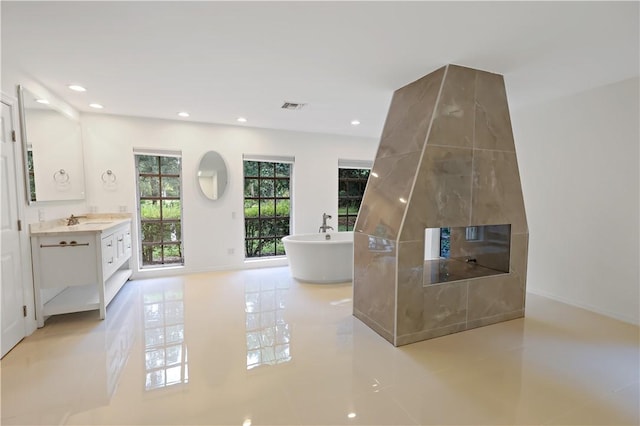 6235 4th St, Vero Beach, FL 32968 - corridor with light tile patterned flooring and recessed lighting