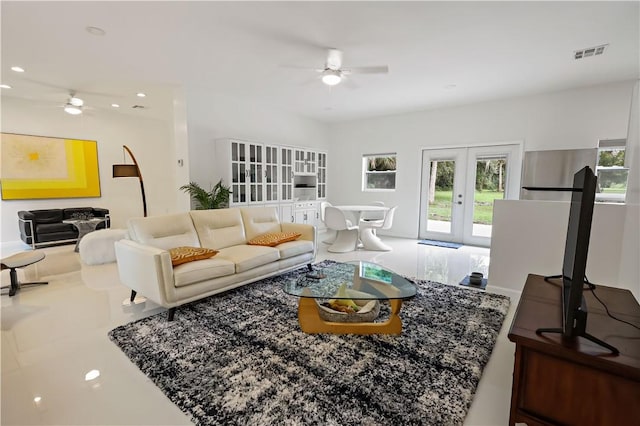 6235 4th St, Vero Beach, FL 32968 - living room with a ceiling fan, french doors, and recessed lighting