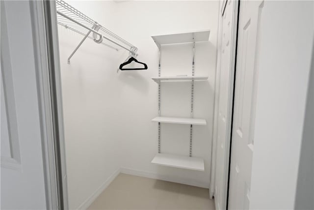 6235 4th St, Vero Beach, FL 32968 - walk in closet featuring tile patterned floors