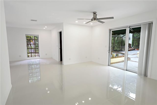 6235 4th St, Vero Beach, FL 32968 - unfurnished room featuring a ceiling fan, tile patterned floors, and recessed lighting