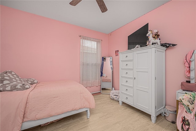 bedroom featuring light wood-type flooring and ceiling fan