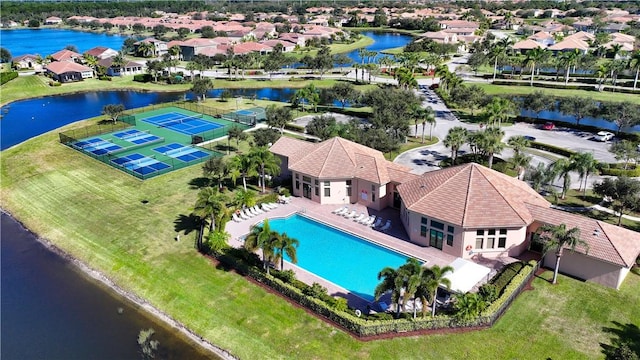 bird's eye view with a water view