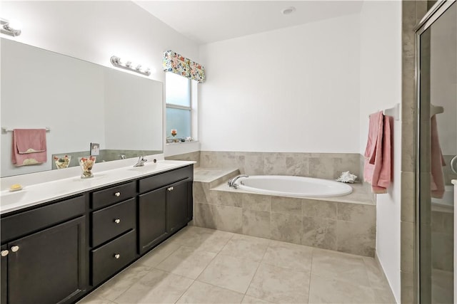 bathroom with tile patterned floors, vanity, and plus walk in shower