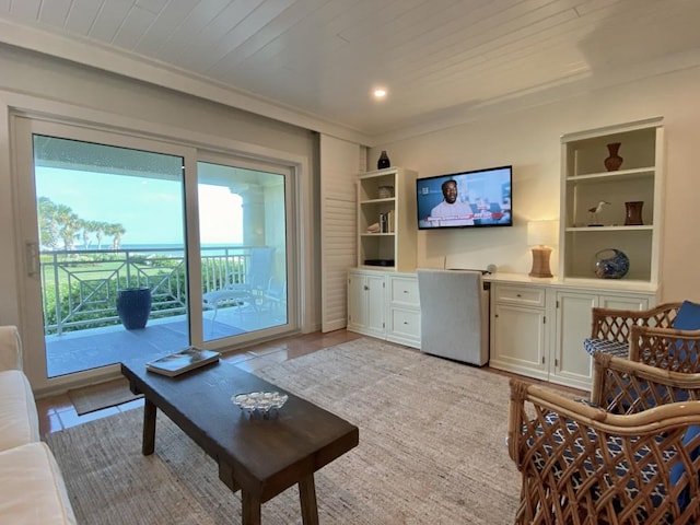 living room featuring light hardwood / wood-style floors and wooden ceiling