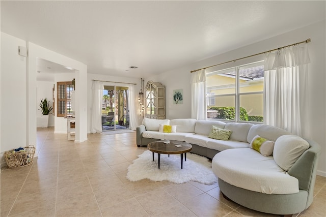 living room featuring light tile patterned floors