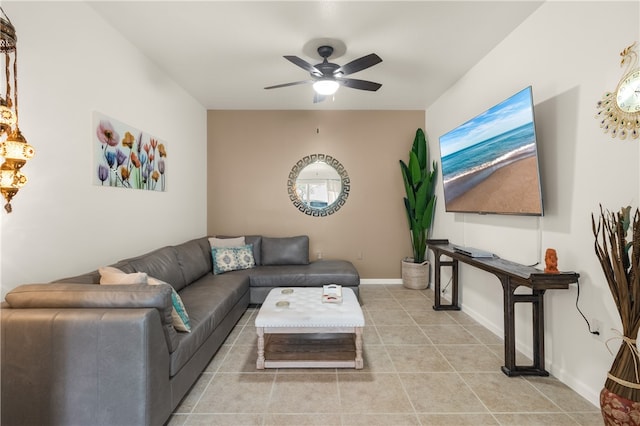 tiled living room featuring ceiling fan