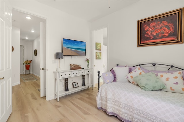 bedroom featuring light wood-type flooring