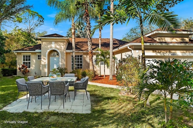 exterior space with outdoor dining area