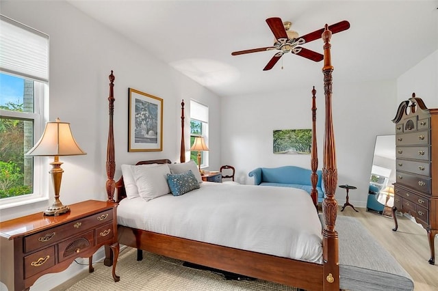 bedroom featuring ceiling fan and light hardwood / wood-style flooring