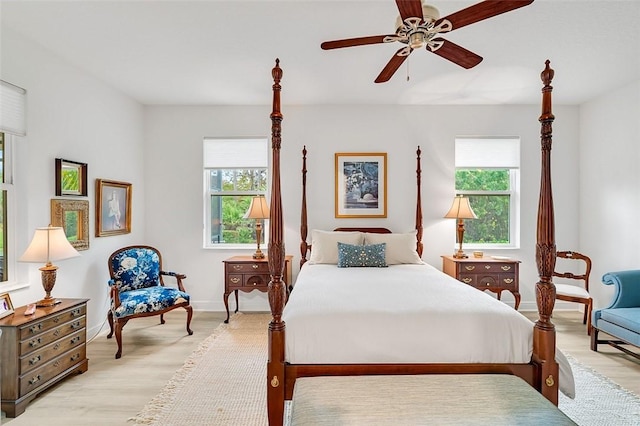 bedroom featuring light hardwood / wood-style flooring and ceiling fan