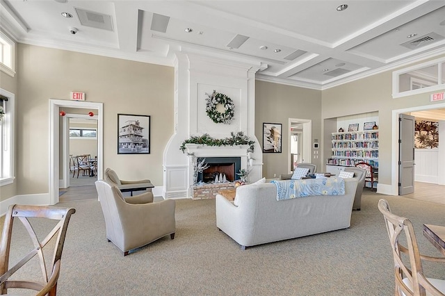 living room with coffered ceiling, crown molding, a fireplace, and light carpet