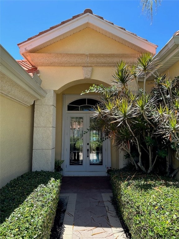 view of exterior entry with french doors