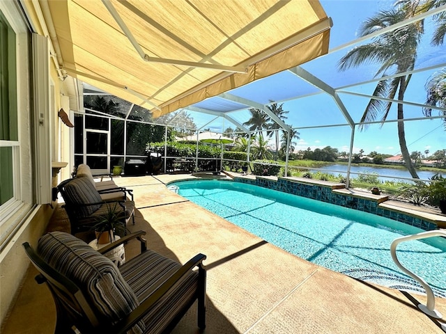 view of swimming pool with a patio area, a water view, and glass enclosure