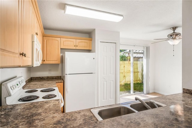 kitchen featuring light brown cabinetry, white appliances, a textured ceiling, ceiling fan, and sink