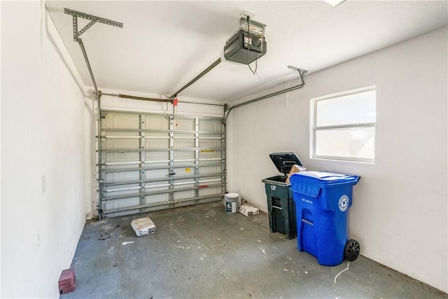 garage featuring a garage door opener