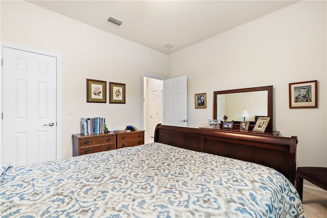 bedroom featuring lofted ceiling